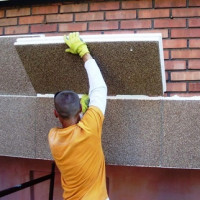 Isolatie voor muren van het huis buiten: een overzicht van opties + tips voor het kiezen van een externe isolatie