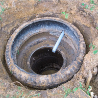 Hoe u een septic tank met banden met uw eigen handen kunt regelen: stapsgewijze instructies