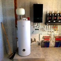 Indirecte verwarmingsketel voor gasketel: details van bediening en aansluiting