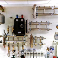 Verwarmingssysteem met natuurlijke circulatie: gemeenschappelijke ontwerpen van watercircuits