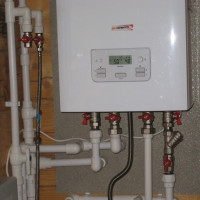 Aansluiten van een dubbelcircuit gasketel op het verwarmingssysteem: eisen en normen + installatiestappen