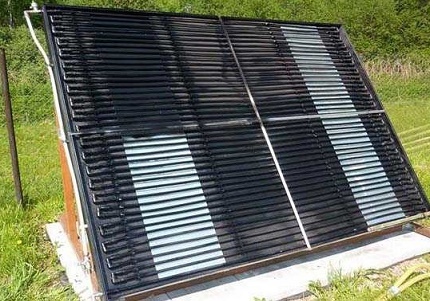 Ang pag-init ng solar ng isang pribadong bahay kasama ang mga bukas na kolektor