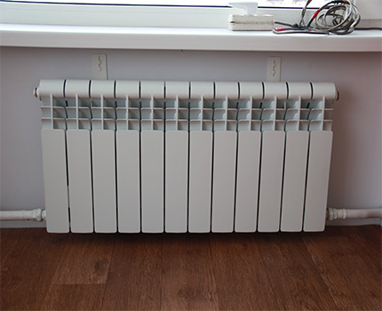 Aansluiting van een verwarmingsradiator met een enkelpijps schema