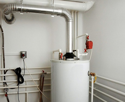 Máy nước nóng khí với buồng đốt mở