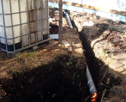 Installation d'une fosse septique et d'un pipeline