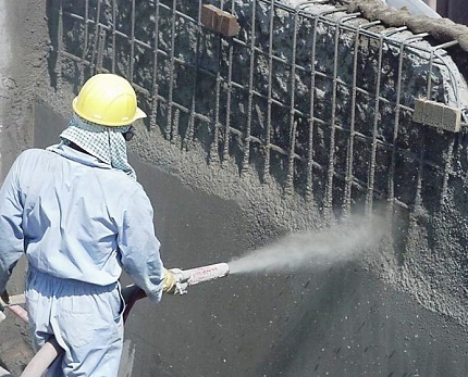 Applying plaster under pressure