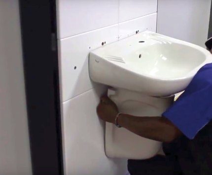 Mounting the semi-pedestal for the sink