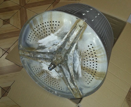 Slib op de trommel van een wasmachine