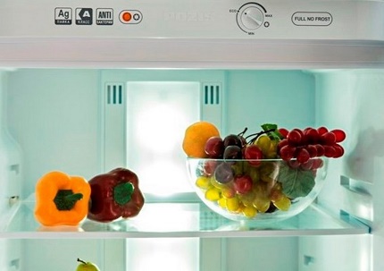Fridge compartment panel with info stickers