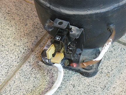 Relay mounted on compressor