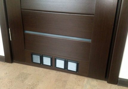 Door with ventilation holes