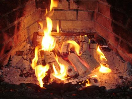 Sawdust briquette burning