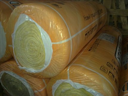 Rolls of fiber insulation in the film