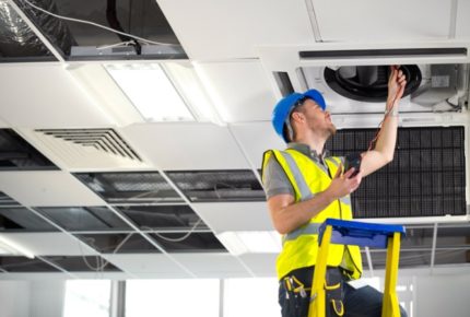 Worker checks ventilation