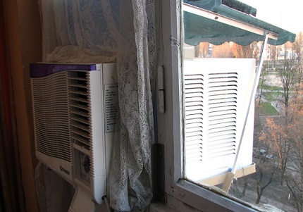 Visor over air conditioner