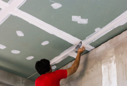 Travaux de finition de cloisons sèches